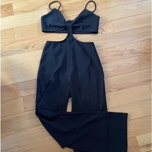 Socialite black cut out jumpsuit, NWOT, size L, wide leg, stretch